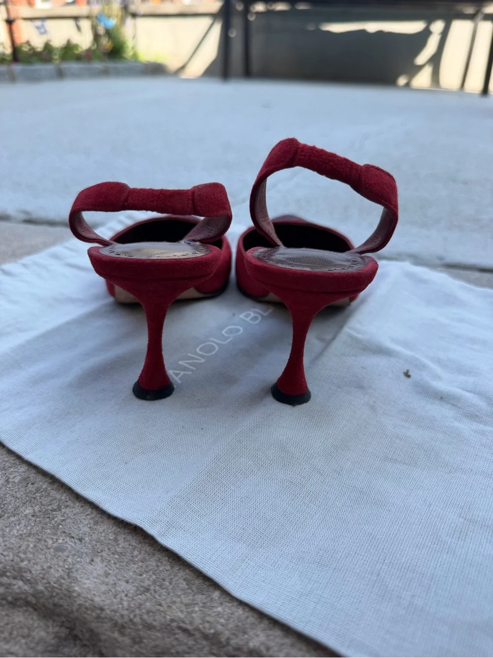 Manolo Blahnik Red Suede Pointed Slingback Heels with Black Trim